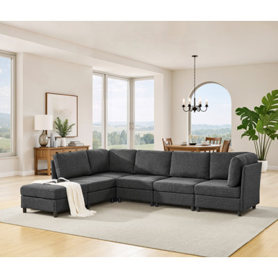 Canapé d'angle moderne avec repose-pieds librement configurable