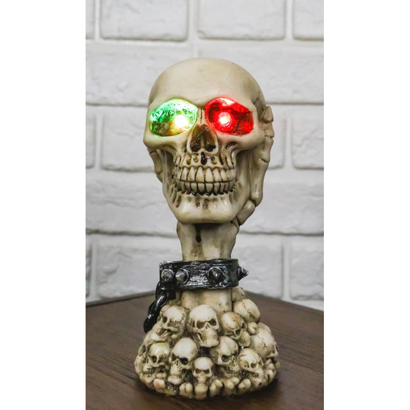Shackled Skeleton Hand Holding Skull With LED Eyes With Morphing Skulls Figurine