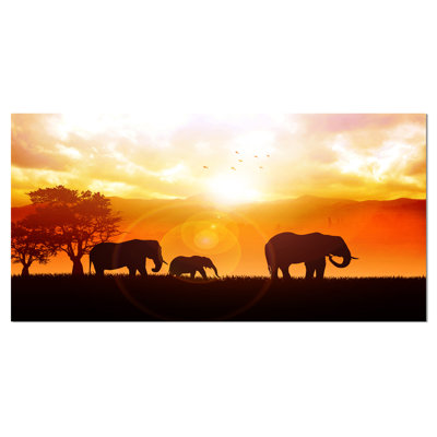 «Elephants Walking at Sunset», reproduction de photo sur toile tendue