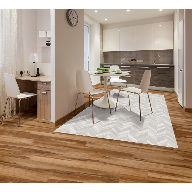 Tapis gris / blanc à chevrons
