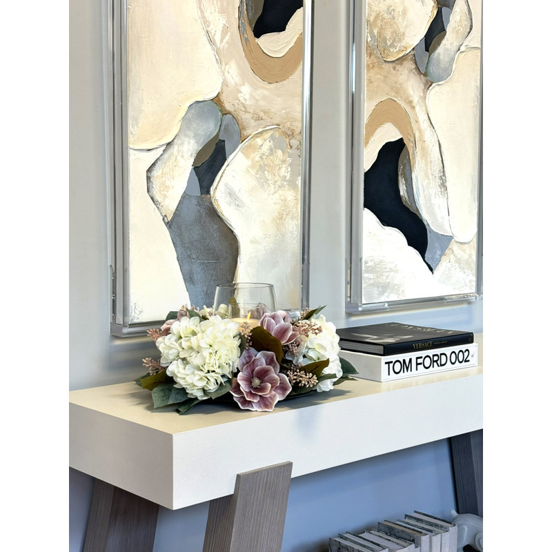 Centre de table bougeoir avec magnolias et hortensias