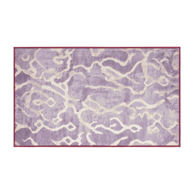 Tapis beige lavable à la machine