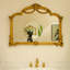 Miroir, miroir pu de style baroque avec un cadre doré orné