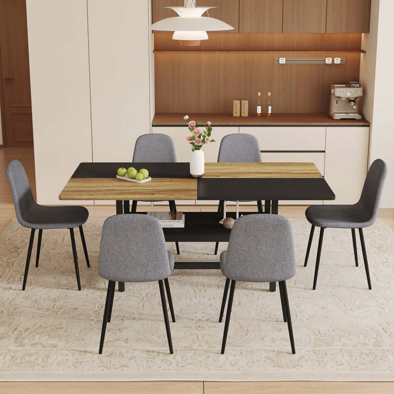 Table and chair set.71*35.4 inch Wooden And Black Spliced Dining Table With Storage Function In The Middle Of The Table Legs.Paired With Chairs Made Of Lnen Fabric.Iron pipe spraying Legs