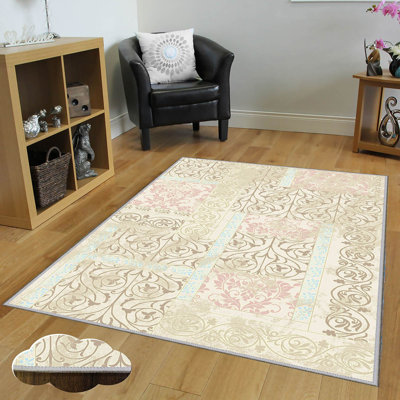 Tapis beige / rose / bleu en polyester tissé à la machine Mciver