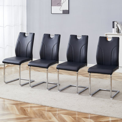 4 chaises de salle à manger en polyuréthane noir - contemporaines et confortables. Housse. Rempli d'éponge. Support de dos ergonomique. Pieds en métal argenté. Structure. Housse pour chaises à glisser 4 pièces pour une utilisation à long terme. Confort rempli. Assis