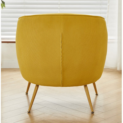 Fauteuil en velours côtelé avec pieds dorés