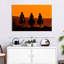 Cowboys au coucher du soleil-107684382