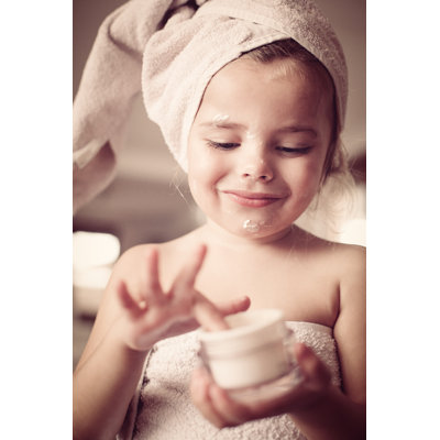 Leftbank Girl Putting Cream - Wrapped Canvas Print