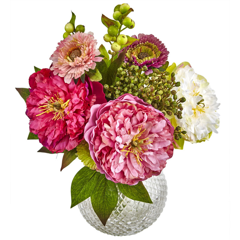 Centre de table à fleurs mélangées dans un vase