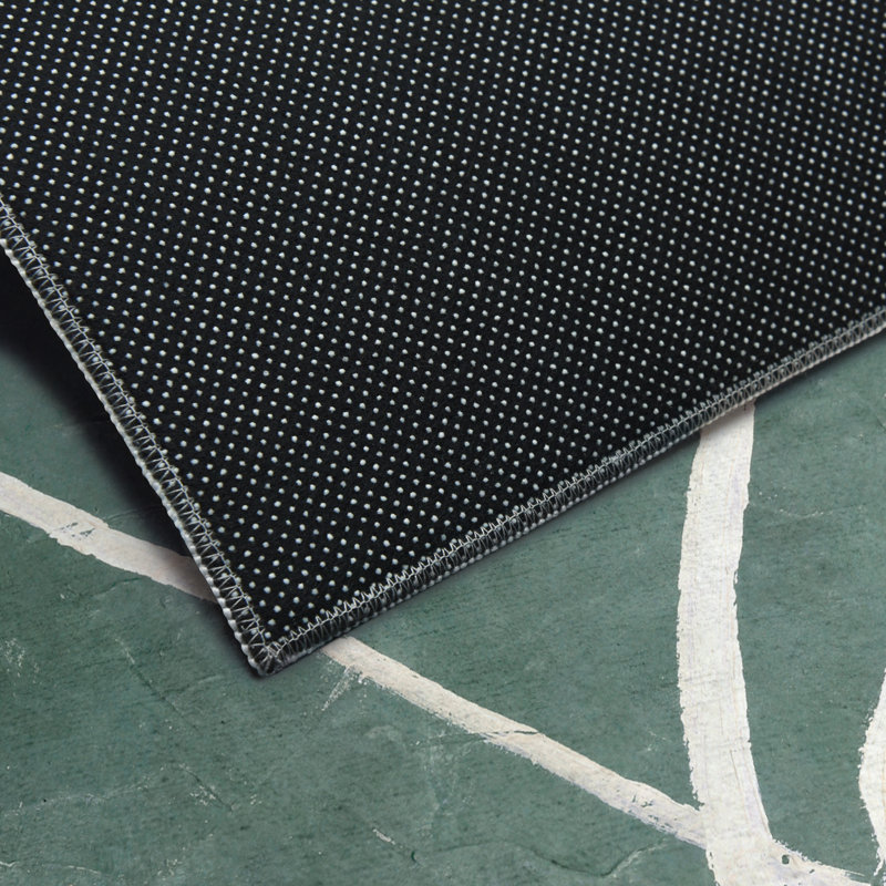 Tapis rectangulaire Divyan avec envers antidérapant