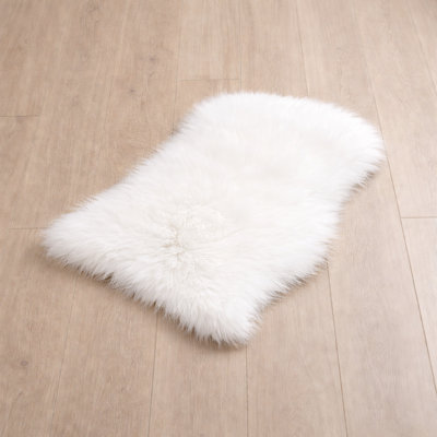 Oval Solid Colour Sheepskin 60cm X 110cm Area Rug