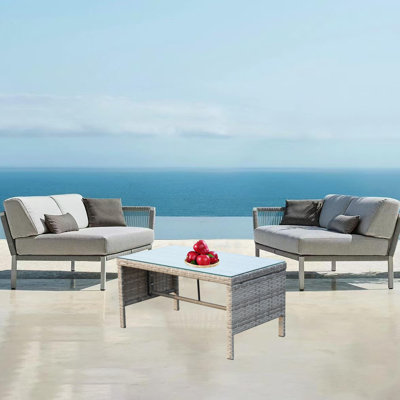 Table basse d'extérieur en osier gris clair avec plateau en verre trempé transparent pour patio et cour arrière