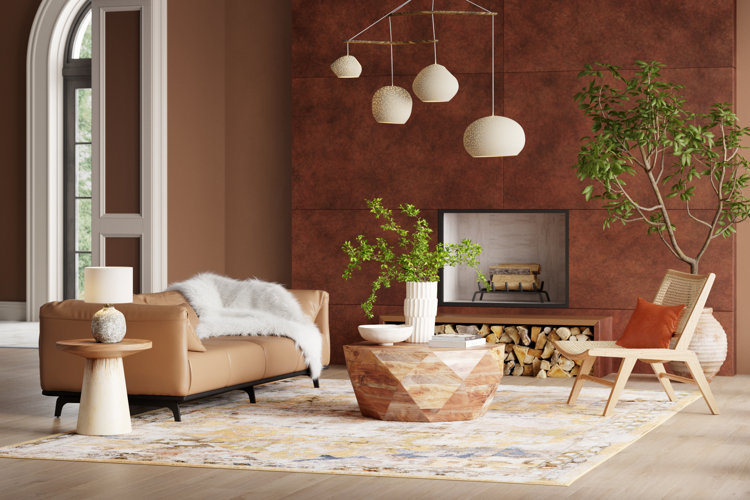 Living room with rich brown-colored walls, a tan sofa, and wood coffee table.