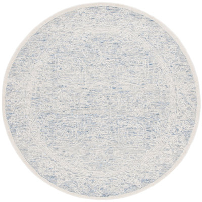 Kayllie Hand Tufted Wool Cotton with Latex Floral Rug in Blue/Ivory