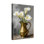 Plantes et fleurs, lis de Calla blancs dans un vase en bronze