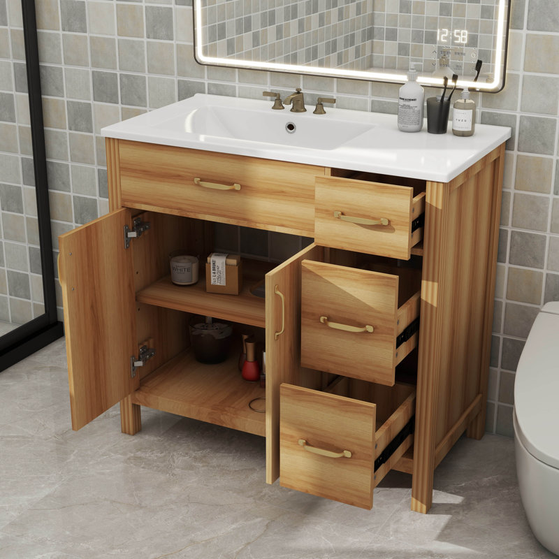 Meuble-lavabo de 36 po en bois comprenant 2 portes à fermeture douce, 3 tiroirs à fermeture douce et une tablette réglable