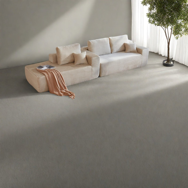 Spacieux canapé modulaire moderne, revêtement beige avec assise profonde pour la maison
