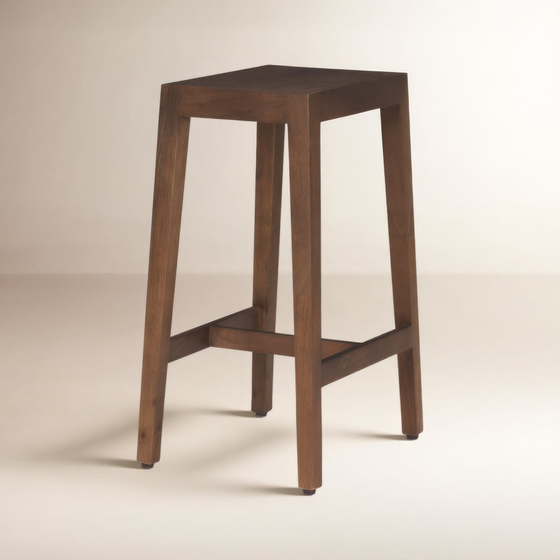 Le tabouret Colony présente un design intemporel et minimaliste avec des lignes épurées et une finition brun moyen chaleureux.