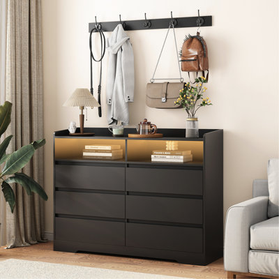 Buffet noir pour le rangement du salon - armoire à 6 tiroirs, offre de nombreux livres et armoire multimédia, un grand tiroir à tiroirs