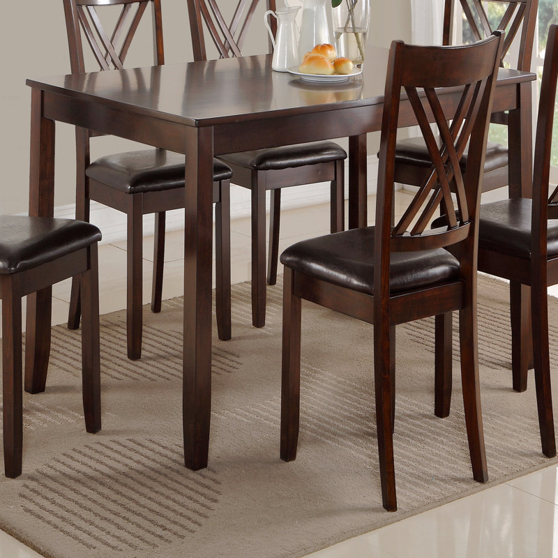 Table rectangulaire avec chaises rembourrées en PU