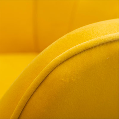 Chaise d'appoint contemporaine capitonnée en velours soyeux avec repose-pieds, jaune