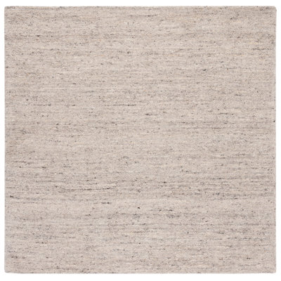 Jaycee Hand Tufted Wool/Cotton & Other Fiber Solid Color Rug in Ivory