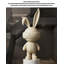 Lapin pelucheux en résine-920835901