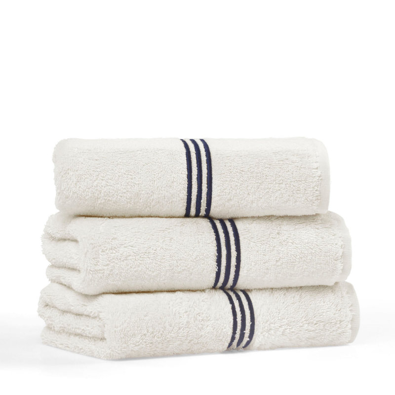 Serviette de bain 100% coton Stalcup, Crème / bleu foncé