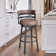 Deherrera Modern Swivel Counter or Bar Stool with Open Low Back and Footrest in Metal and Faux Leather