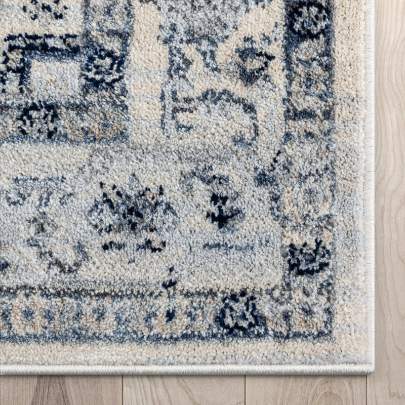 Ivory and Blue Medallion Synthetic 5' x 7' Area Rug