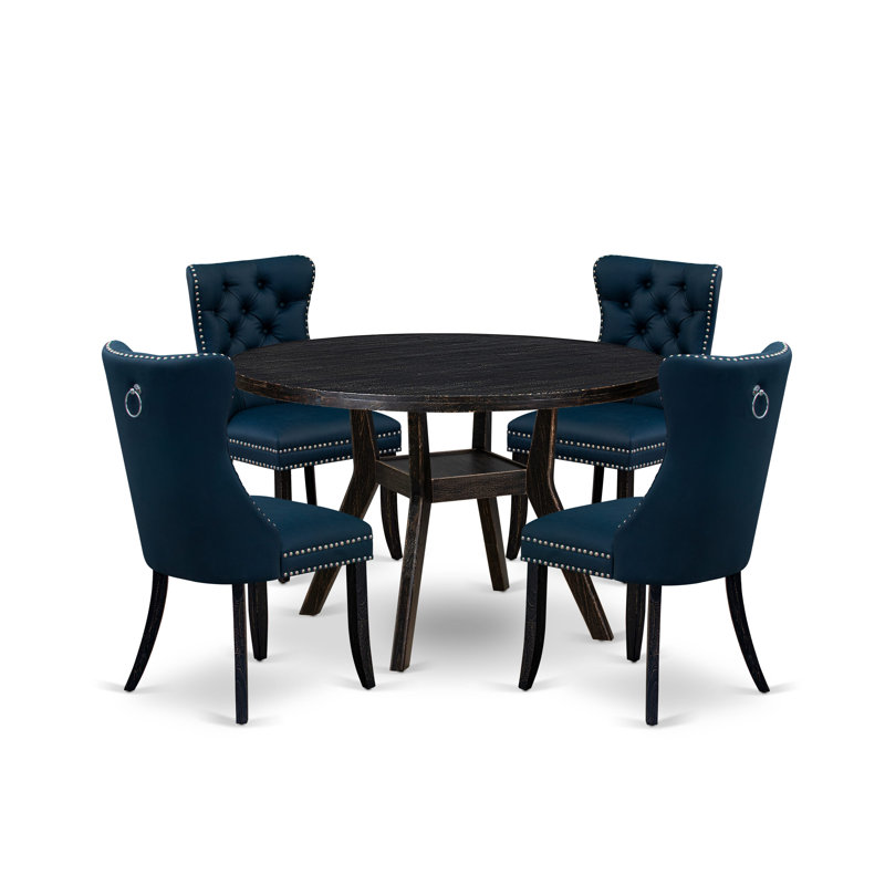 L'ensemble de table de salle à manger 5 pièces se compose d'une table ronde de 48 po avec piédestal et de 4 chaises Parson en tissu de polyester bleu marine, noir sablé