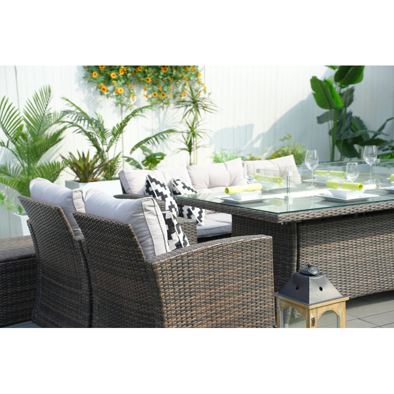 Bozhan 7 - Person Patio Dining Set with Rectangular Table , Cushions Included