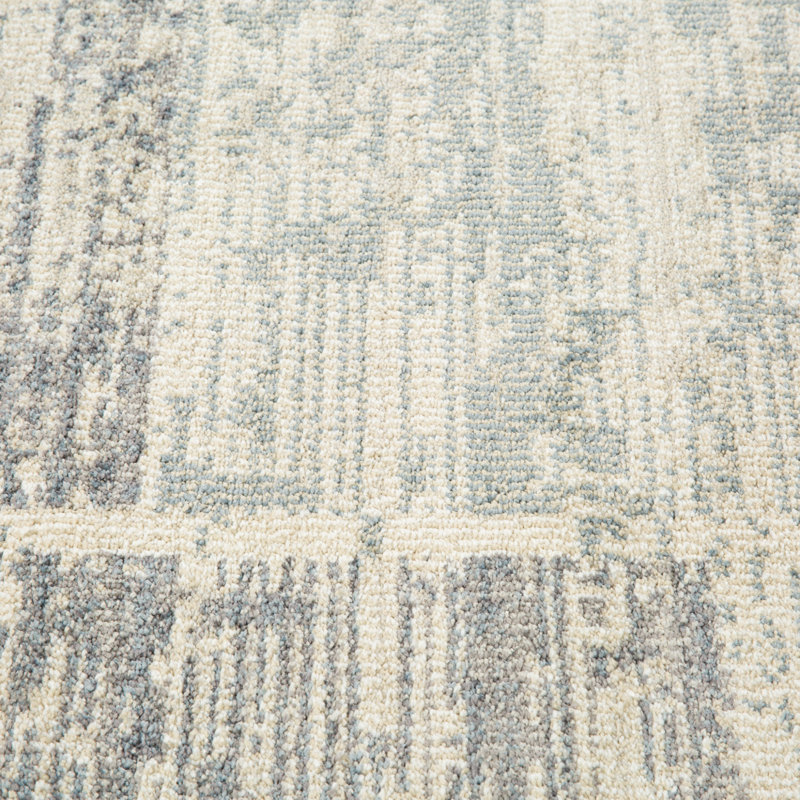 Tapis bleu clair tissé à la machine 5 pi x 7 pi avec frange