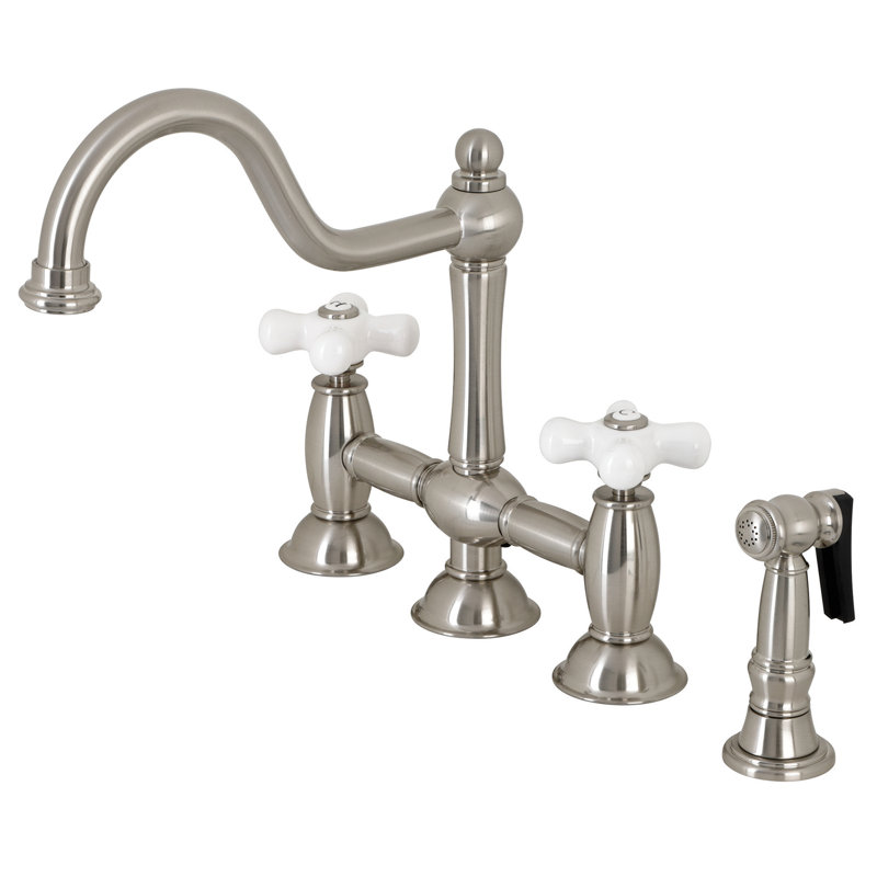 Kingston Brass Restoration Two-Handle 4-Hole Deck Mount Bridge Kitchen Faucet with Brass Side Sprayer