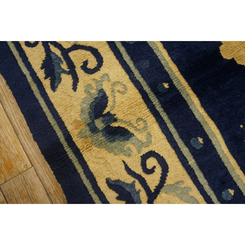 Tapis chameau en laine bleu marine antique