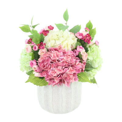 Hydrangeas and Ranunculus Arranged in Ceramic Pot