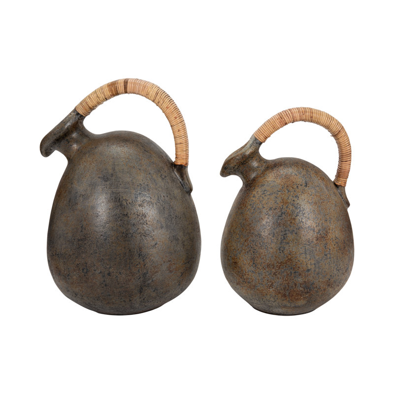 Decorative Terracotta Vase with Sculpted Form, Tilted Mouth, Matte Pottery Texture, and Woven Rattan Wrapped Handle for Textural Contrast and Handcrafted Visual Interest in Casual Home Accents
