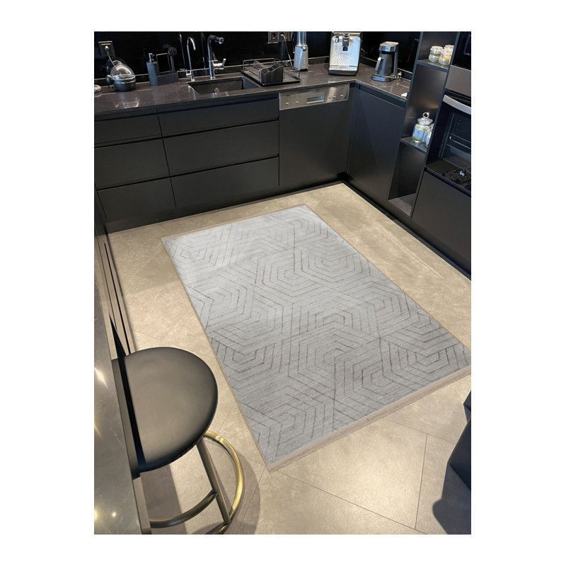 Tapis décoratif lavable à la machine à motif géométrique beige à motif géométrique moderne