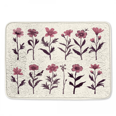 Tapis de bain rose à motif de fleurs sauvages