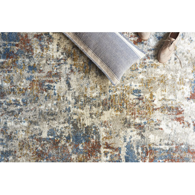 Tapis abstrait bleu / brun Gilchrist