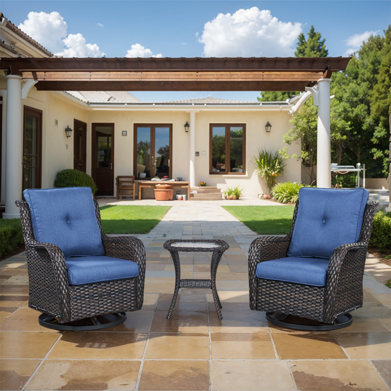 Schutt 3 Piece Patio Rattan Seating Group including 2 Swivel & Gliding chairs and 1 Side Table with Cushions, Blue