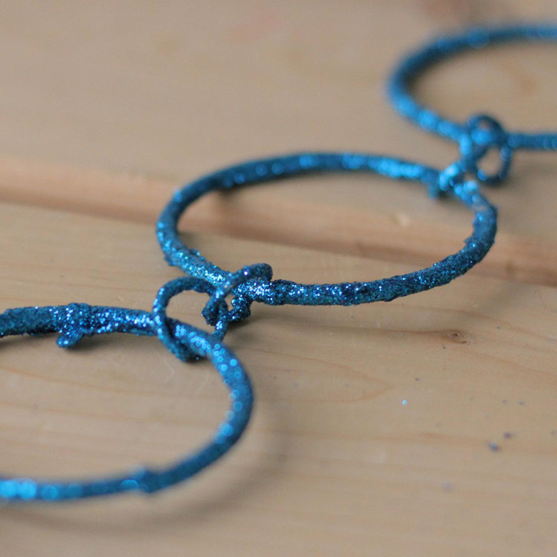 5' x 1.75" Sparkling Glitter Round Circle Chain Artificial Christmas Garland - Unlit, Turquoise Peacock Blue
