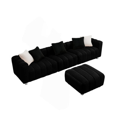 Canapé en velours côtelé avec repose-pieds et coussins Défino