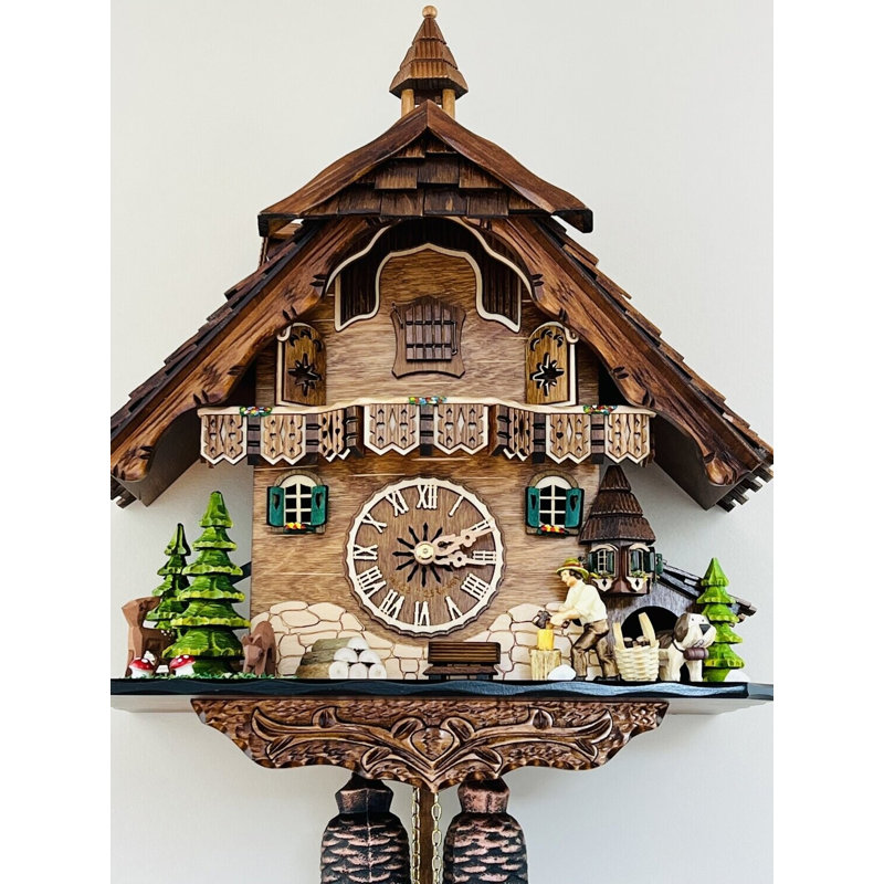  Eight Day Cuckoo Clock – 13 in Height – Cottage Turret with Animated Man Chopping Wood