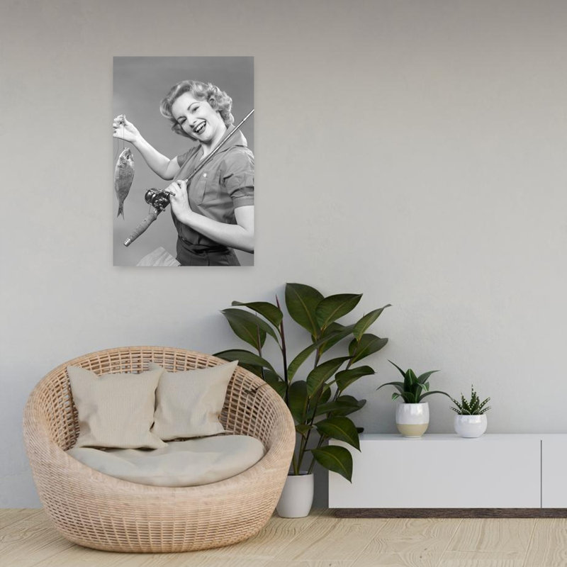 1950S Smiling Woman With A Fishing Rod Over Her Shoulder Holding Up A Fish Looking At Camera Classic Retro Vintage Fish Animal Portrait Wall Art