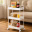 Chariot de rangement mobile blanc en plastique mince à trois couches, adapté aux coutures étroites, convenant pour ranger des articles divers dans plusieurs décors