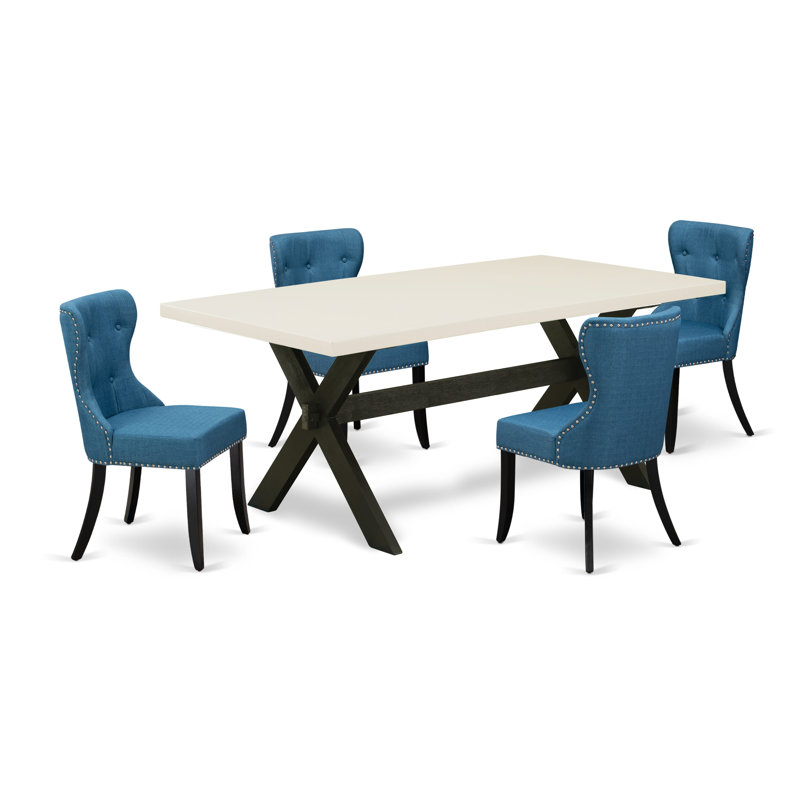 L'ensemble de mobilier de salle à manger 5 pièces comprend une table de salle à manger rectangulaire avec pieds en X et 4 chaises rembourrées en tissu de lin bleu, finition noire brossée