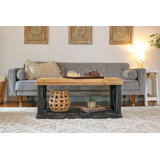 Table basse noire à pieds en X