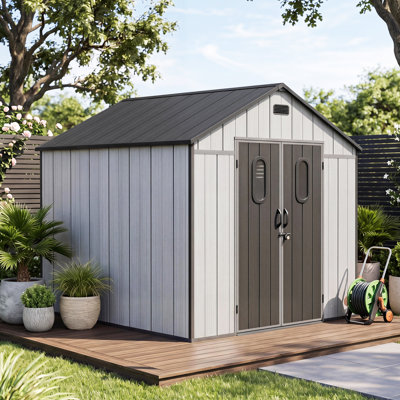 Abri de jardin portatif en plastique avec terrasse et toit en pente